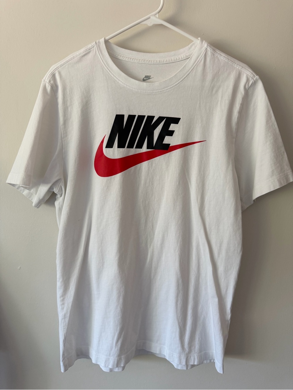 Nike White Short Sleeve Tee with Black Logo and Red Swoosh